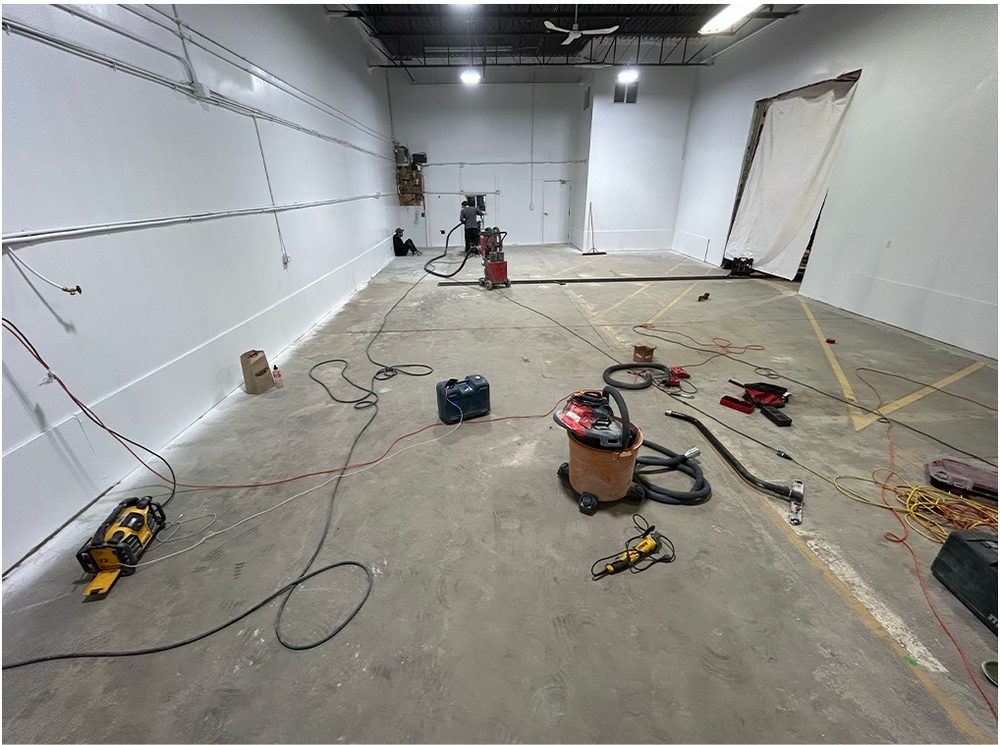 Stripped garage floor during preparation