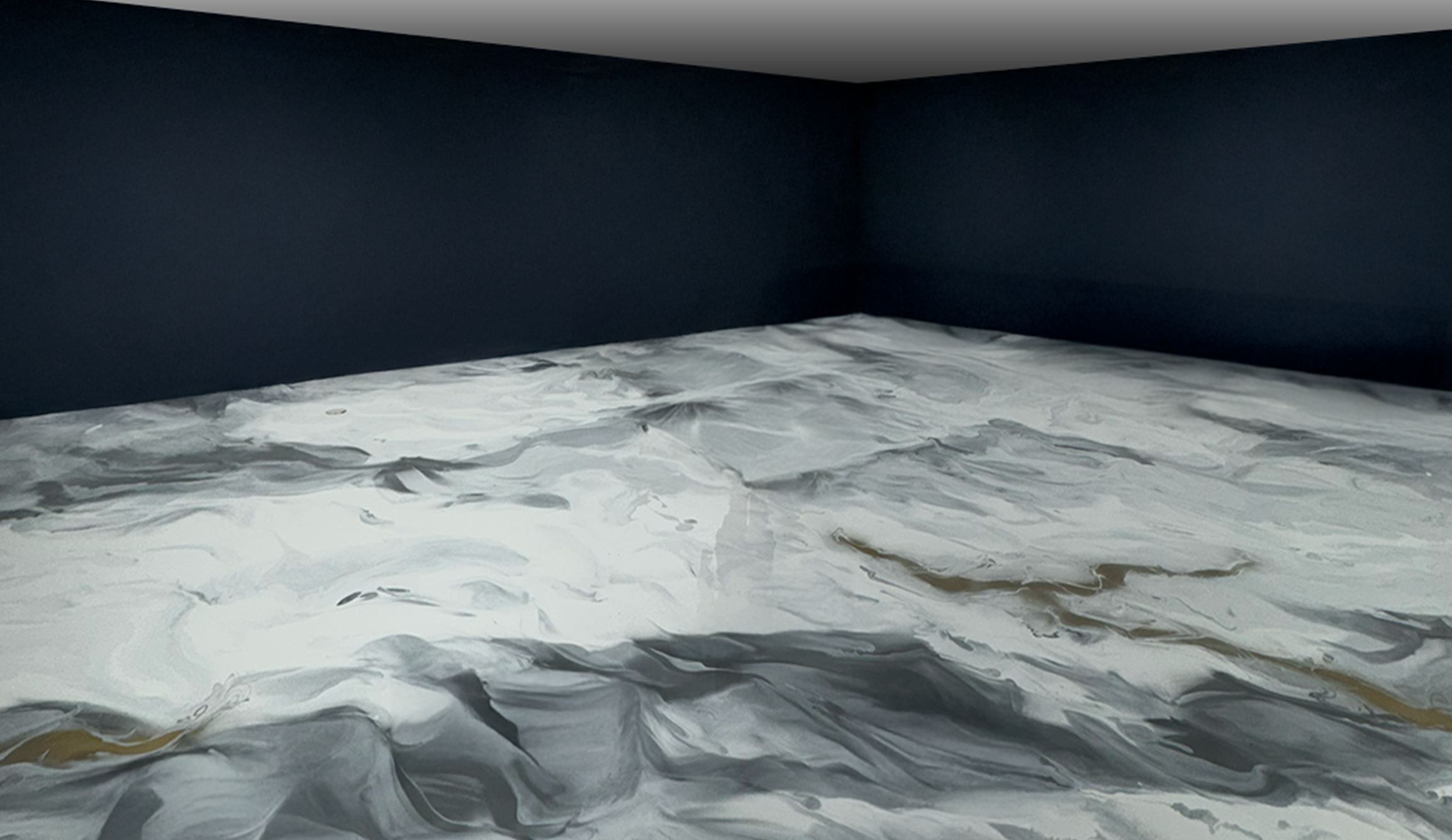 Metallic epoxy floor with a white and grey marbled finish